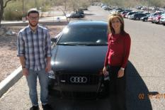Eileen P. and her son (and his new car)